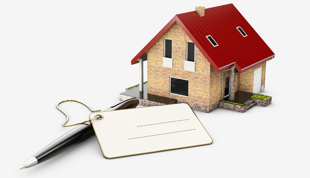 House model beside planning and financing tools.